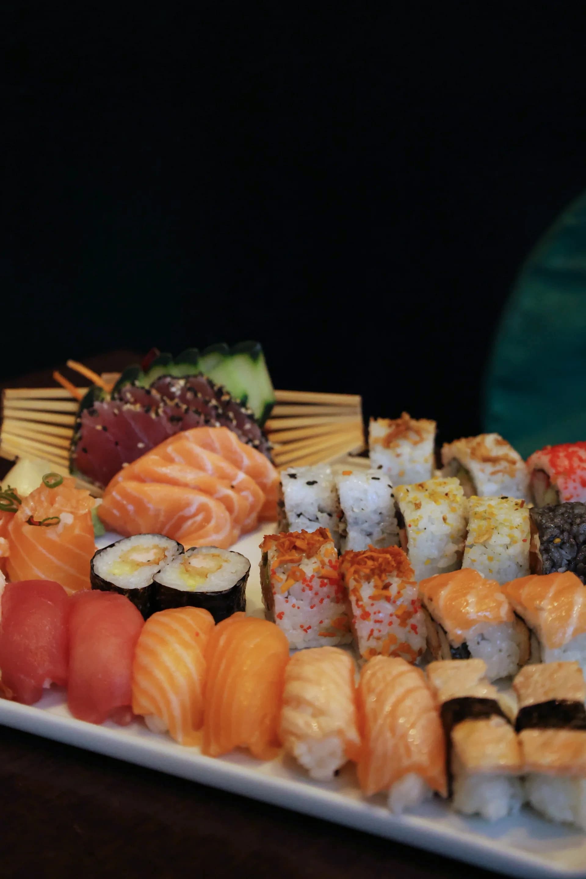 Generous Koko sushi platter with sashimi, nigiri, and signature rolls